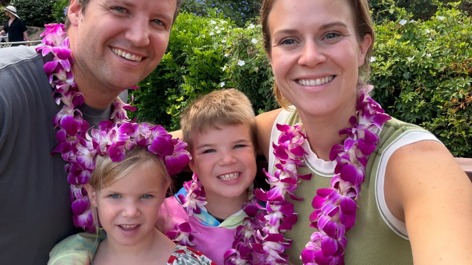 My family wearing leis on our trip to Hawaii