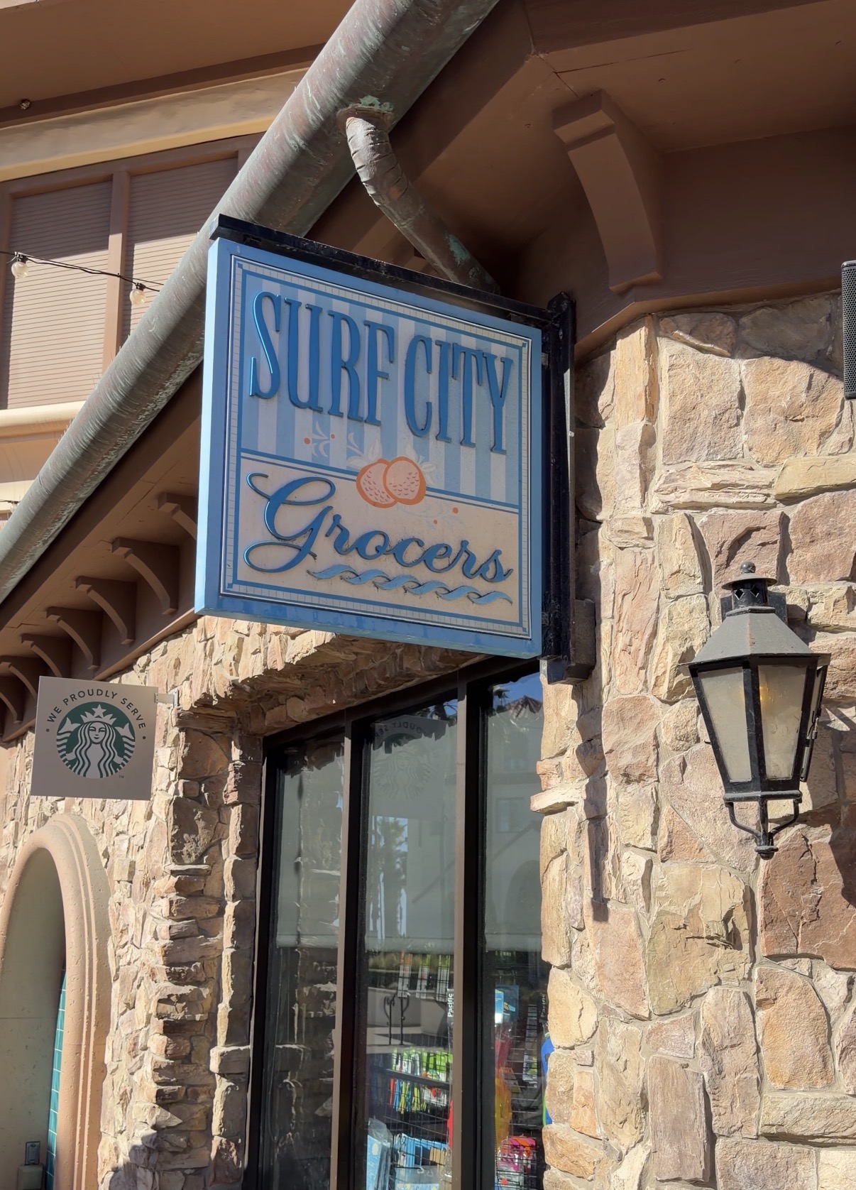 The Surf City Grocers sign at the resort